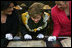 Mrs. Laura Bush is shown an ancient map during her visit Saturday, April 5, 2008, to the Croatian State Archives in Zagreb.