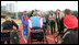 Mrs. Laura Bush visits with members of the Russian Paralympic Team Sunday, April 6, 2008, during a visit to Central Sochi Stadium in Sochi, Russia.