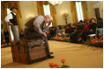 Mrs. Laura Bush and Salma Kikwete, First Lady of Tanzania, watch a performance from Ford's Theatre's new production, One Destiny, Monday, April 7, 2008, in the East Room of the White House.