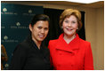 Mrs. Laura Bush poses for a photo with Charm Tong following the 2008 Vital Voices Global Leadership Awards Gala Monday, April 7, 2008, at The John F. Kennedy Center for Performing Arts in Washington, D.C. Mrs. Bush presented Charm Tong with the 2008 Vital Voices Global Leadership Award for her dedication in co-founding SWAN, the Shan Women's Action Network and established a school for Shan State youth who have fled Burma for Thailand.