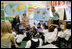 Mrs. Laura Bush is joined by U.S. Education Secretary Margaret Spellings as she visits the first grade classroom and students of teacher Laura Gilbertson, right, Monday, April 14, 2008, at the Martin Luther King Elementary School in Washington, D.C., to mark the tenth anniversary of Teach for America Week.