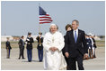 President George W. Bush, Mrs. Laura Bush and daughter, Jenna Bush, walk with Pope Benedict XVI after the Pontiff's arrival Tuesday, April 15, 2008, at Andrews Air Force Base, Maryland.