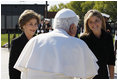 Mrs.Laura Bush and Jenna Bush greet Pope Benedict XVI on his arrival to Andrews Air Force Base, Md., Tuesday, April 15, 2008, the first stop of a six-day visit to the United States.