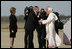 President George W. Bush and Laura Bush greet Pope Benedict XVI on his arrival to Andrews Air Force Base, Md., Tuesday, April 15, 2008, the first stop of a six-day visit to the United States.