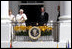 President George W. Bush and Mrs. Laura Bush stand with Pope Benedict XVI as he acknowledges the cheers from the crowd from the South Portico balcony Wednesday, April 16, 2008, on the South Lawn of the White House. 