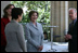 Mrs. Laura Bush is joined by Mrs. Sarah Brown, wife of the Prime Minister of the United Kingdom, and Lady Sheinwald, wife of the British Ambassador to the United States, as they participate in a tour of the Smithsonian American Art Museum's "The Honor of Your Company Is Requested: President Lincoln's Inaugural Ball" Exhibit Thursday, April 17, 2008, in Washington, D.C. Their tour is lead by Mr. Charles Robertson, Guest Curator, "The Honor of Your Company Is Requested: President Lincoln's Inaugural Ball."