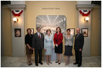 Mrs. Bush poses for a photo during a tour of the Smithsonian American Art Museum's Exhibit "To Honor of Your Company Is Requested: President Lincoln's Inaugural Ball" Thursday, April 17, 2008, in Washington, D.C. Mrs. Bush is joined by, from left to right, Ms. Alison McNally, Acting Under Secretary for Finance and Administration, Smithsonian Institute, Dr. Richard Kurin, Acting Under Secretary for History, Art and Culture, Smithsonian Institute, Mrs. Sarah Brown, wife of Prime Minister of the United Kingdom, Lady Sheinwald, wife of the British Ambassador to the United States, and Mr. Charles Robertson, Guest Curator, "the Honor of Your Company Is Requested: President Lincoln's Inaugural Ball" Exhibit.