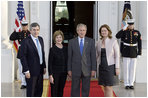 President George W. Bush and Laura Bush welcome British Prime Minister Gordon Brown and his wife, Sarah Brown, to the White House Thursday evening, April 17, 2008, for a private social dinner.