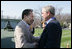 President George W. Bush and Laura Bush welcome South Korean President Lee Myung-bak and his wife, Kim Yoon-ok, Friday, April 18, 2008, to the Presidential retreat at Camp David, Md.