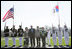 President George W. Bush and Laura Bush pose with South Korean President Lee Myung-bak and his wife, Kim Yoon-ok, for a photo Friday, April 18, 2008, on their arrival to the Presidential retreat at Camp David, Md.