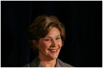 Mrs. Laura Bush applauds a fellow speaker at the Congressional Malaria Caucus Thursday, April 24, 2008, at the U.S. Captiol in Washington, D.C., where she delievered a report on President Bush's Malaria Initiative.