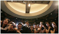 Crowds in Seoul at the United States Embassy eagerly respond to President George W. Bush and Mrs. Laura Bush on August 6, 2008. 