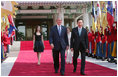 President George W. Bush walks with President Lee Myung-bak of the Republic of Korea, along with Mrs. Laura Bush and Barbara Bush, as they arrive at the Blue House, the presidential residence, Wednesday, Aug. 6, 2008, in Seoul.