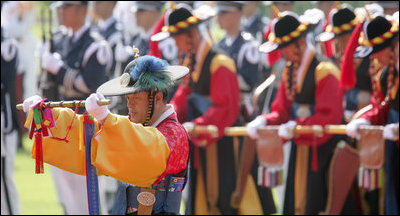 Ceremonial dancers perform Wednesday, Aug. 6, 2008, during arrival ceremonies in Seoul for President George W. Bush and Mrs. Laura Bush.