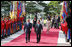 President George W. Bush and South Korean President President Lee Myung-bak, joined by Mrs. Laura Bush, Mrs. Kim Yoon-ok, and daughter Ms. Barbara Bush, participate in a welcoming ceremony in the Grand Garden of the Blue House Wednesday, August 6, 2008, in Seoul.