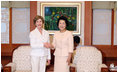 Mrs. Laura Bush meets with Mrs. Kim Yoon-ok, wife of the President of the Republic of Korea, during a coffee in Seoul on August 6, 2008.