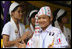 Residents of the Mae La Refugee Camp at Mae Sot, Thailand, perform traditional dance for Mrs. Laura Bush during her visit to the camp on the Burma border on Aug. 7, 2008. It has been almost 20 years since the August 8, 1988 crackdown in Burma which began forcing residents from the country. Many of the people in the Mae La Refugee Camp and the other eight camps along the border have been born in the camps or lived most of their lives in the camps, waiting for conditions to improve in Burma or to move to the United States and other countries.