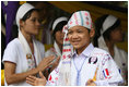 Residents of the Mae La Refugee Camp at Mae Sot, Thailand, perform traditional dance for Mrs. Laura Bush during her visit to the camp on the Burma border on Aug. 7, 2008. It has been almost 20 years since the August 8, 1988 crackdown in Burma which began forcing residents from the country. Many of the people in the Mae La Refugee Camp and the other eight camps along the border have been born in the camps or lived most of their lives in the camps, waiting for conditions to improve in Burma or to move to the United States and other countries.