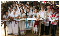 During her visit to the Mae La Refugee Camp in Mae Sot, Thailand, Mrs. Laura Bush visits with a class studying grammar. Mrs. Bush's daughter, Ms. Barbara Bush is to the right of Mrs. Bush in the Aug. 7, 2008 visit. The camp, the largest of nine on the border, houses at least 39,000 refugees fleeing the oppression in Burma.