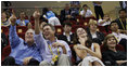 President George W. Bush is joined by his brother, Marvin Bush, daughter, Ms. Barbara Bush and Mrs. Laura Bush as they attend the U.S. Women's Olympic Basketball Team's match Saturday, Aug. 9, 2008, against the Czech Republic team at the Beijing 2008 Summer Olympics Games.