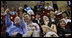 President George W. Bush is joined by his brother, Marvin Bush, daughter, Ms. Barbara Bush and Mrs. Laura Bush as they attend the U.S. Women's Olympic Basketball Team's match Saturday, Aug. 9, 2008, against the Czech Republic team at the Beijing 2008 Summer Olympics Games.