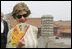 Mrs. Laura Bush finds relief from the Beijing heat in an ornamental fan during a visit Friday, Aug. 9, 2008, to the Forbidden City.