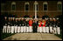 President George W. Bush and Laura Bush pose for a photograph with participants of the Evening Parade at the Marine Barracks Friday, August 29, 2008, in Washington D.C.