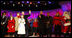 President George W. Bush and Mrs. Laura Bush stand on stage Thursday, Dec. 4, 2008, with Santa, entertainers and guests, during the 85th Lighting of the National Christmas Tree on the Ellipse in Washington, D.C. With them, from left, are: Members of Step Afrika!; Lindsey Van Horn, 9, and Kayleigh Kepler, 11, the official tree lighters; Phil Vassar; Jon Secada, and Santa and his elf.