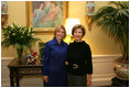 Mrs. Laura Bush poses Tuesday, Dec. 16, 2008, with Mrs. Ana Ligia Mixco Sol de Saca, wife of El Salvador's President Elias Antonio Saca, after Mrs. Saca's arrival in the Residence of the White House for a coffee.