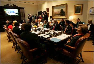 Mrs. Laura Bush leads a video teleconference Thursday, Dec. 18, 2008, with the Afghan Women Entrepreneurs in the Roosevelt Room of the White House.