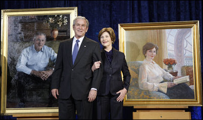 President George W. Bush and Mrs. Laura Bush stand in front of their portraits Friday, Dec. 19, 2008, after the unveiling at the Smithsonian's National Portrait Gallery in Washington, D.C. The portrait of Mrs. Bush was done by Aleksander Sasha Titovets; the Presidential portrait was done by Robert Anderson.