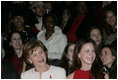 Mrs. Laura Bush, accompanied by daughter, Barbara Bush, watch fashion models during The Heart Truth Red Dress Collection 2008 fashion show in New York, Friday, Feb. 1, 2008. More than a dozen celebrated women showcased America’s top designers in one-of-a-kind Red Dresses to raise awareness of heart disease in women.