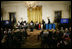 President George W. Bush and Mrs. Laura Bush watch as the St. Veronicas Youth Steel Orchestra performs at the Helping America's Youth Event Thursday Feb. 7, 2008, in the East Room of the White House.