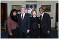 President George W. Bush and First Lady Laura Bush pose for photos with Lincoln Medal winner Dr. Benjamin Carson and his wife Candy Carson prior to a ceremony in the East Room of the White House honoring Abraham Lincoln's 199th Birthday, Sunday, Feb. 10, 2008.