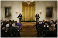 President George W. Bush and First Lady Laura Bush listen as Actor Avery Brooks, (L), and Dr. Allen Guelzo make remarks during a ceremony in the East Room of the White House honoring Abraham Lincoln's 199th Birthday, Sunday, Feb. 10, 2008.