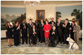 Mrs. Laura Bush participates in a photo opportunity with Jim Nussle, Director, Office of Management and Budget and employee of the year government workers from the AbilityOne 2007-2008 workforce Monday, Feb. 22, 2008, in the Diplomatic Room at the White House.