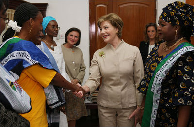 Mrs. Laura Bush is welcomed on her arrival to the WAMA Foundation Sunday, Fab. 17, 2008 in Dar es Salaam, Tanzania, for a meeting to launch the National Plan of Action for Orphans and Vulnerable Children.