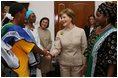 Mrs. Laura Bush is welcomed on her arrival to the WAMA Foundation Sunday, Fab. 17, 2008 in Dar es Salaam, Tanzania, for a meeting to launch the National Plan of Action for Orphans and Vulnerable Children.