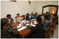 Mrs. Laura Bush participates in a roundtable discussion with faith-based HIV/AIDS Prevention Program graduates Sunday, Feb. 17, 2008, at Karimjee Hall in Dar es Salaam, Tanzania. Mrs. Bush reconfirmed America’s commitment to the Tanzanian people and their continued efforts against HIV/AIDS. At left is Mrs. Salma Kikwete, First Lady of Tanzania.