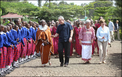 Students line up to welcome President George W. Bush and Mrs. Laura Bush Monday, Feb. 18, 2008, to the Maasai Girls School in Arusha, Tanzania.