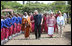 Students line up to welcome President George W. Bush and Mrs. Laura Bush Monday, Feb. 18, 2008, to the Maasai Girls School in Arusha, Tanzania.