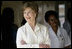 Mrs. Laura Bush smiles as she meets with patients and staff Monday, Feb. 18, 2008, doing a tour of the outpatient clinic at the Meru District Hospital in Arusha, Tanzania.