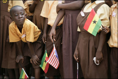 A young student at the Mallam D/A Primary School in Accra, Ghana, watches for the arrival of Mrs. Laura Bush and Ghana first lady Theresa Kufuor, Wednesday, Feb. 20, 2008 in Accra, Ghana.