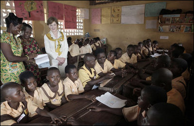 Mrs. Laura Bush and Ghana first lady Theresa Kufuor visits a classroom Wednesday, Feb. 20, 2008, during their tour at the Mallam D/A Primary School in Accra, Ghana.