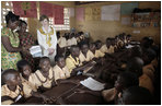 Mrs. Laura Bush and Ghana first lady Theresa Kufuor visits a classroom Wednesday, Feb. 20, 2008, during their tour at the Mallam D/A Primary School in Accra, Ghana.