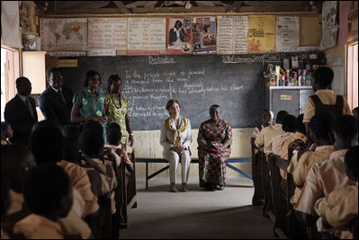 Mrs. Laura Bush and Ghana first lady Theresa Kufuor visits with a kindergarten classroom Wednesday, Feb. 20, 2008, at the Mallam D/A Primary School in Accra, Ghana.