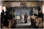 Mrs. Laura Bush and Ghana first lady Theresa Kufuor visits with a kindergarten classroom Wednesday, Feb. 20, 2008, at the Mallam D/A Primary School in Accra, Ghana.