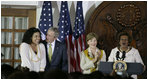 President George W. Bush congratulates singer Jordin Sparks after she sang the U.S. National Anthem Wednesday, Feb. 20, 2008, during the welcome for President Bush and Mrs. Laura Bush to the U.S. Ambassador's Residence in Accra, Ghana, by Ambassador Pamela Bridgewater.