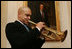 Jazz trumpeter Irvin Mayfield entertains during a reception at the White House, Monday, Jan. 28, 2008, prior to the State of the Union. Mr. Mayfield, a New Orleans native and appointed cultural ambassador for the city, joined Mrs. Laura Bush in the First Lady's Box for the President's address.