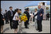 President George W. Bush and Laura Bush are welcomed on their arrival Sunday, July 6, 2008 to the New Chitose International Airport, to attend the Group of Eight Summit in Toyako, Japan.